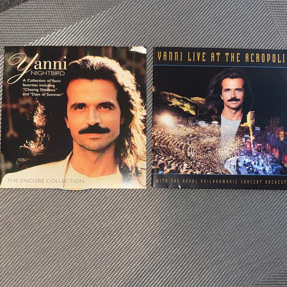 **3/$15** Yanni Nightbird and Live at the Acropolis CDs